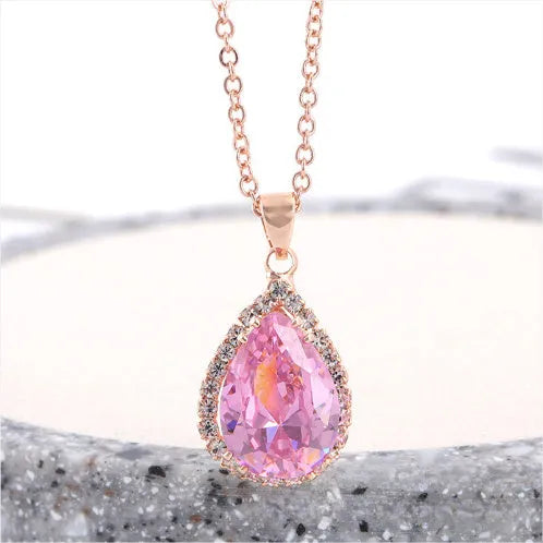 Rose gold geometric drop shape necklace with rhinestones in pink colour option