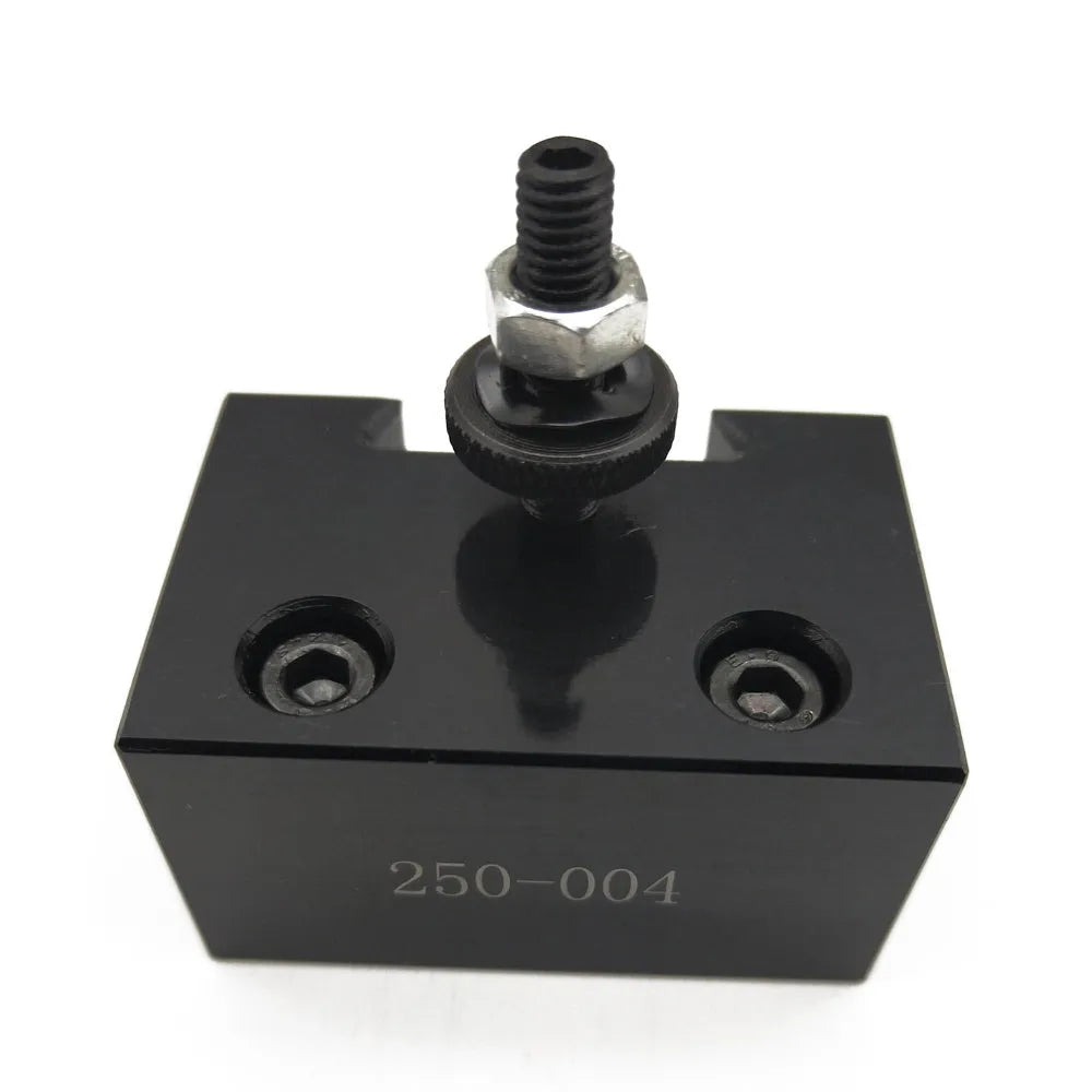 Machifit 250-000 steel quick change tool post and lathe tool holders on a workshop bench