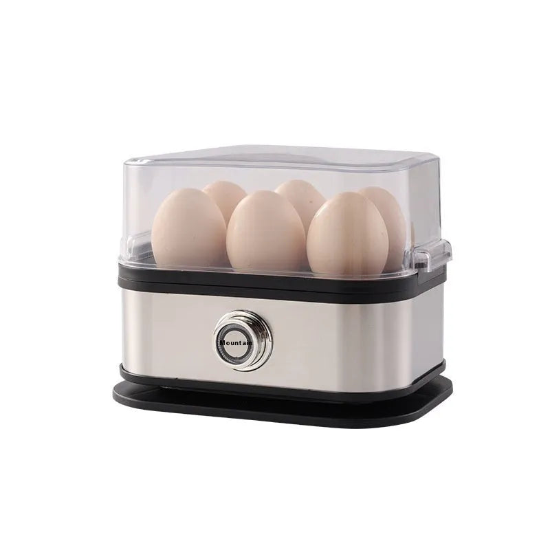 Black portable stainless steel egg boiler with carrying belt on a table.