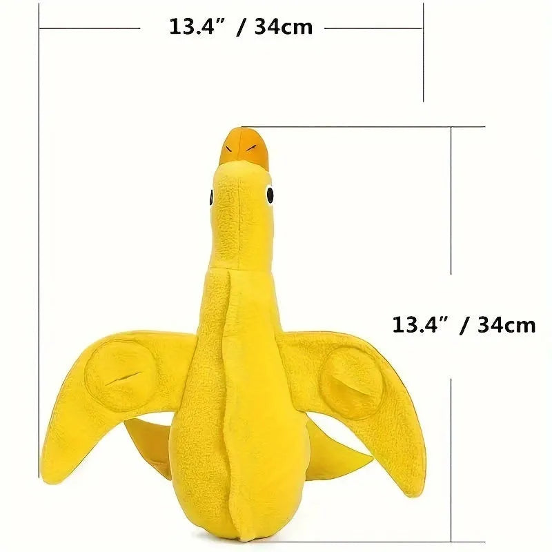 Yellow plush teddy dog toy with internal squeaky duck for training and food leak feature