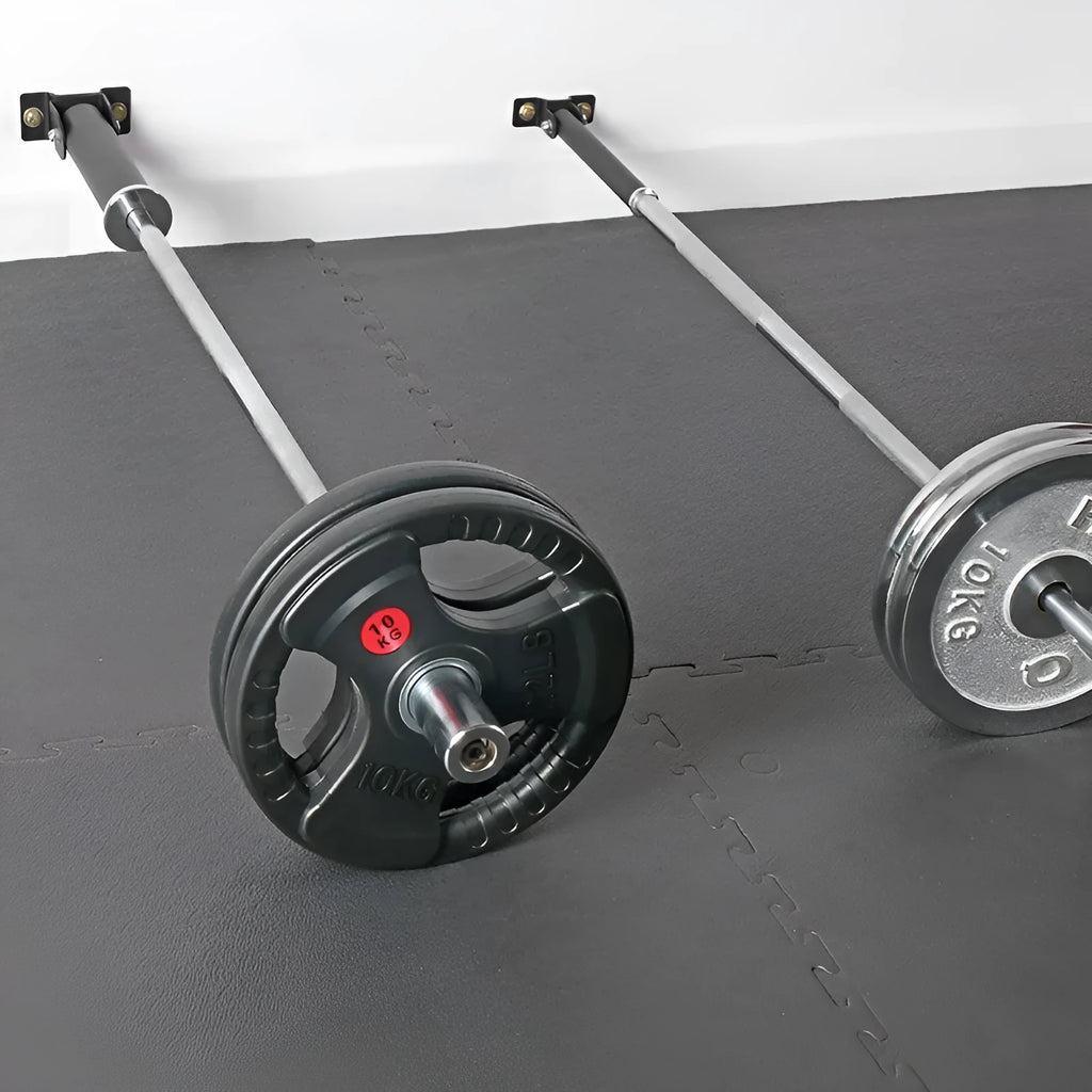 Steel wall-mounted barbell gun barrel rack holding multiple rods.
