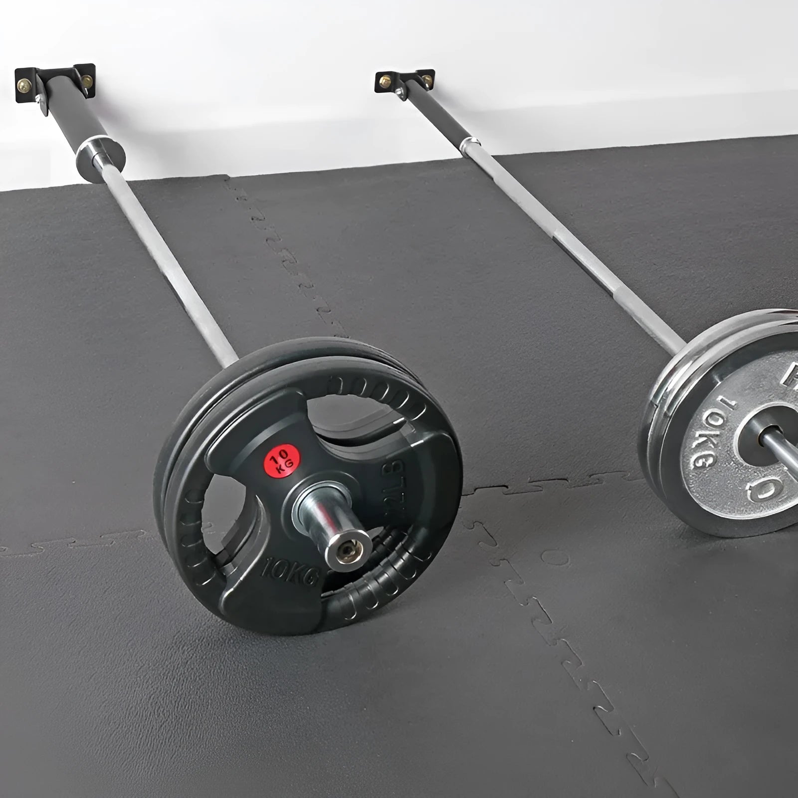 Steel wall-mounted barbell gun barrel rack holding multiple rods.