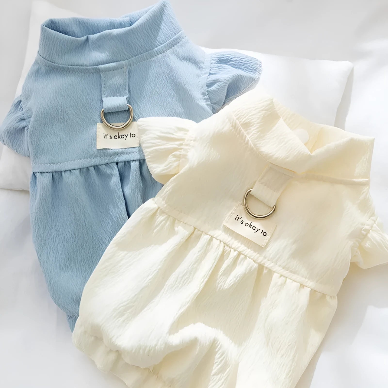 Solid colour polyester flying sleeve dress for small dog in Bondi Blue with cloth label