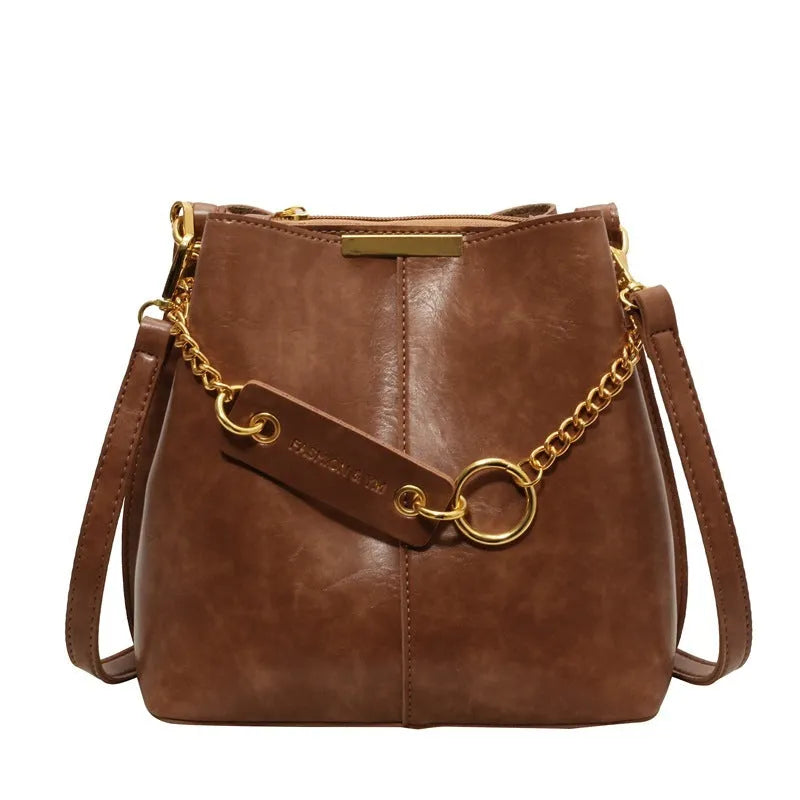 Large capacity PU shoulder bag with wide strap in black colour, sewing thread detail, crossbody style