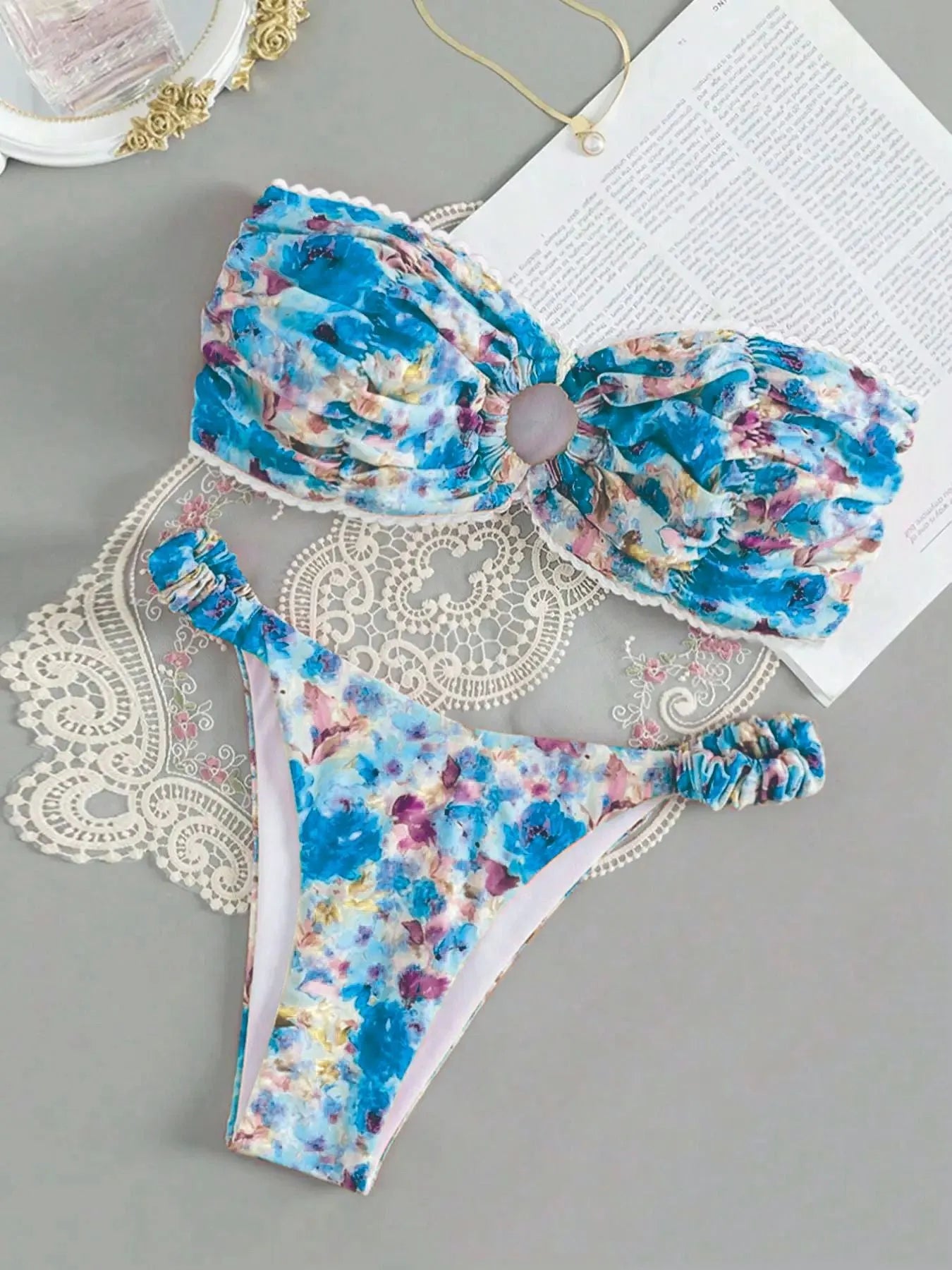 Women's tube top bikini swimsuit with lace detailing in floral print