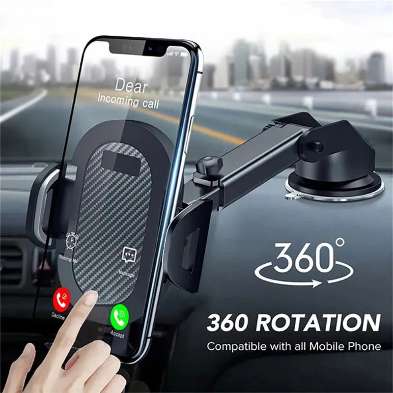 Black universal car phone holder for smartphones 4 to 7 inches wide on a car dashboard