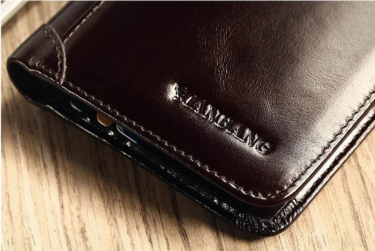 Men's compact leather wallet open showing card slots, change pouch, photo slot, and dark privacy compartment.