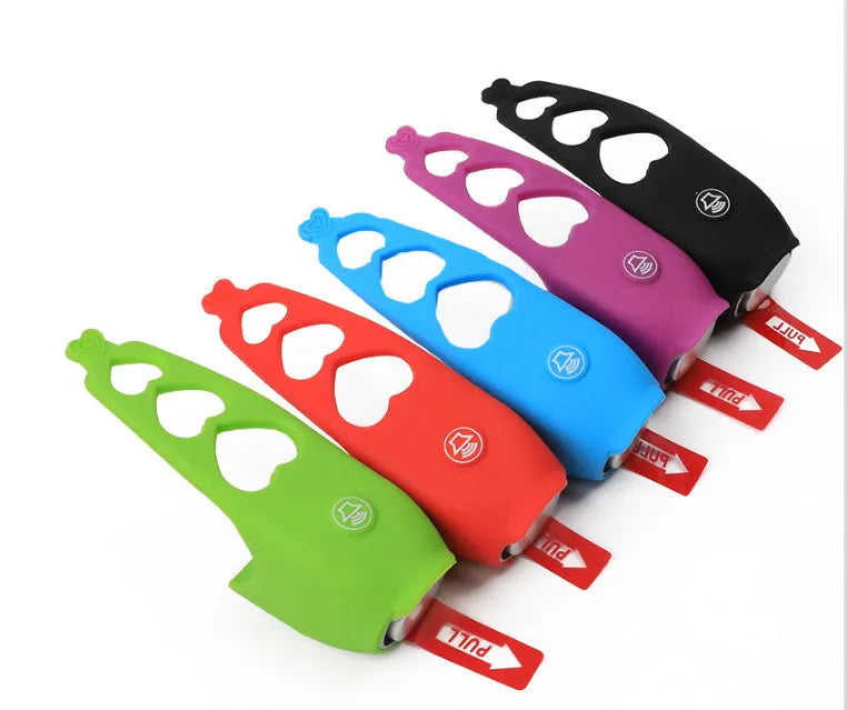 Electronic bicycle horn for handlebars in plastic, available in black green purple white red blue, with button battery power