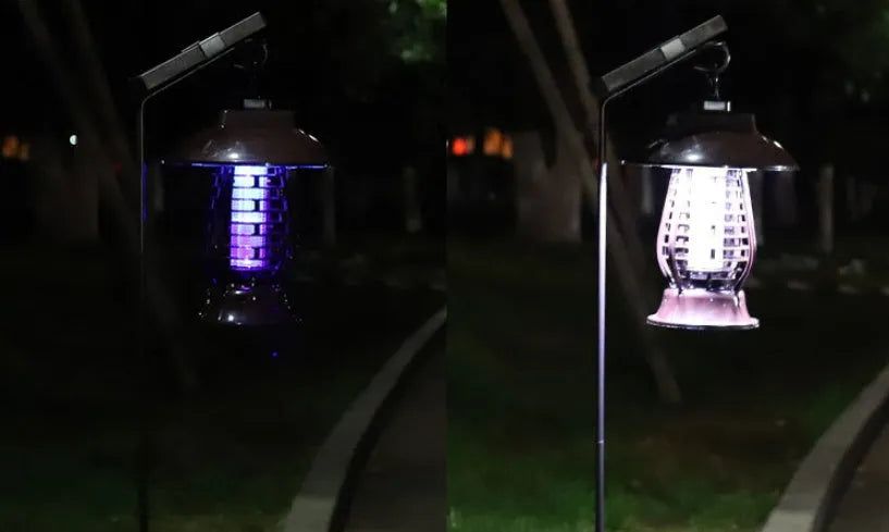 White and purple solar-powered mosquito lamp for outdoor garden use with solar panel and LED lights