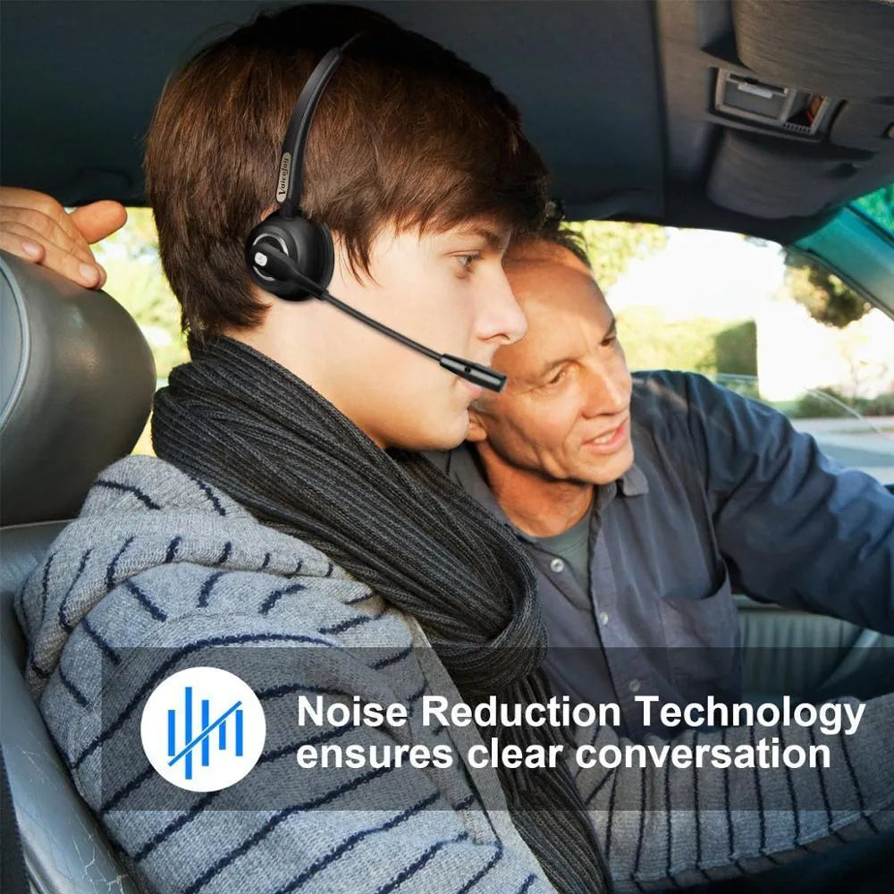 Over-ear Bluetooth headset with microphone for truck drivers and office use, shown with USB charging cable.