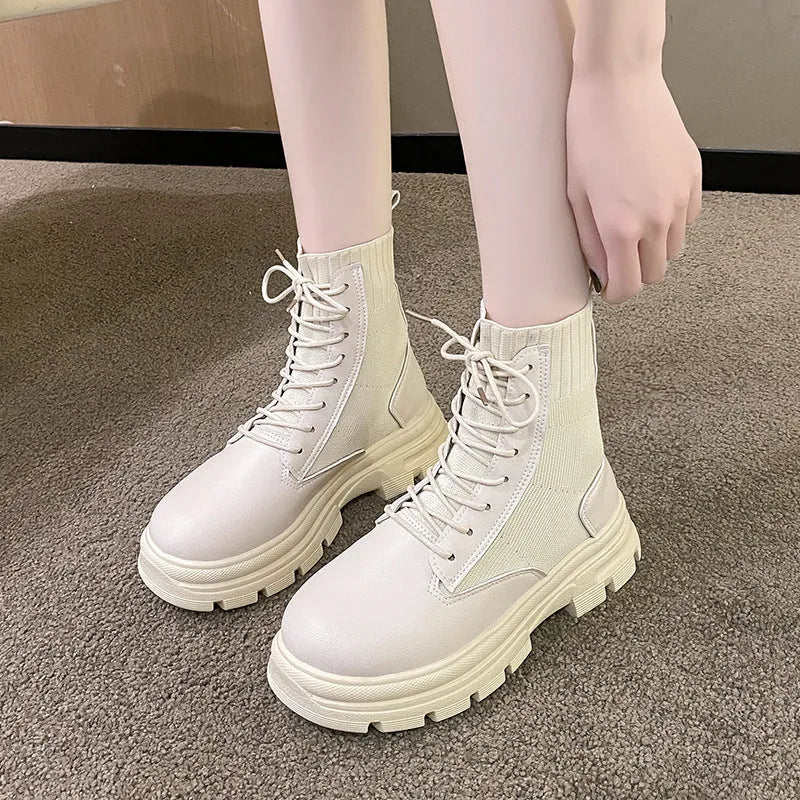Women's round head lace-up knitted mouth Martin boots with tassel detail in black, side view