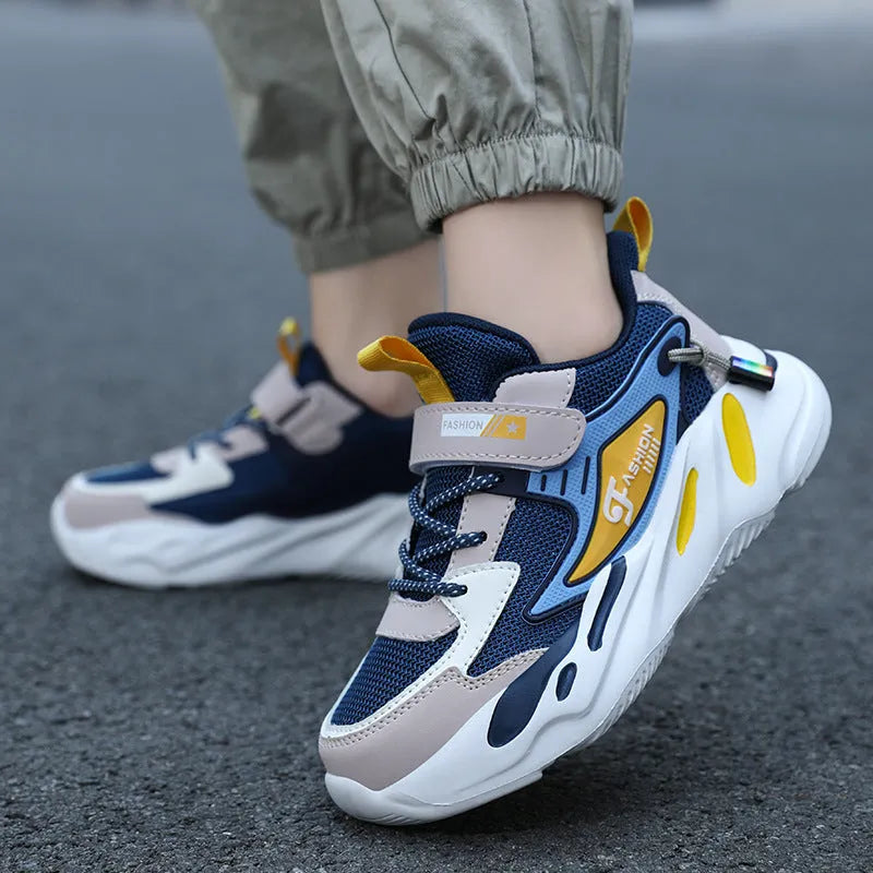 Boys dark blue and black Velcro sports running shoes with a breathable mesh upper