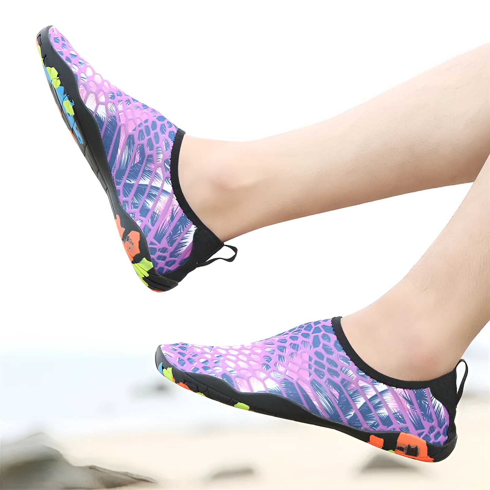 A pair of beach wading shoes for swimming, shown in camouflage colour with Lycra upper and EVA sole.