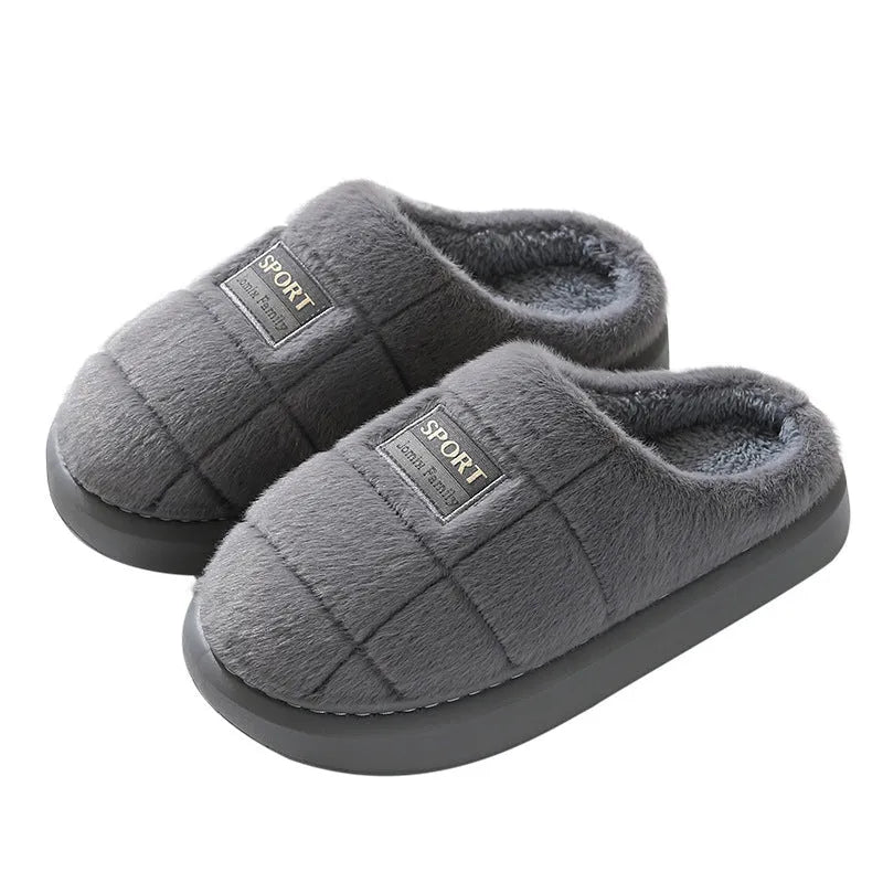 Men's grey thick-soled winter slippers with rabbit hair upper and textured sole.