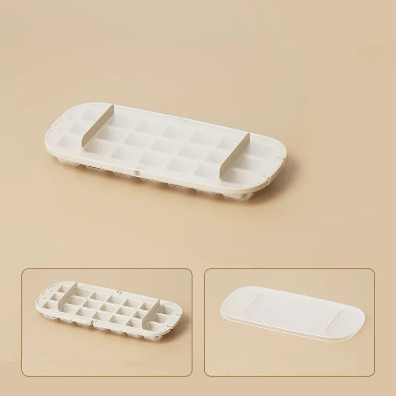 High capacity ice cube tray with grid design and integrated ice shovel storage compartment