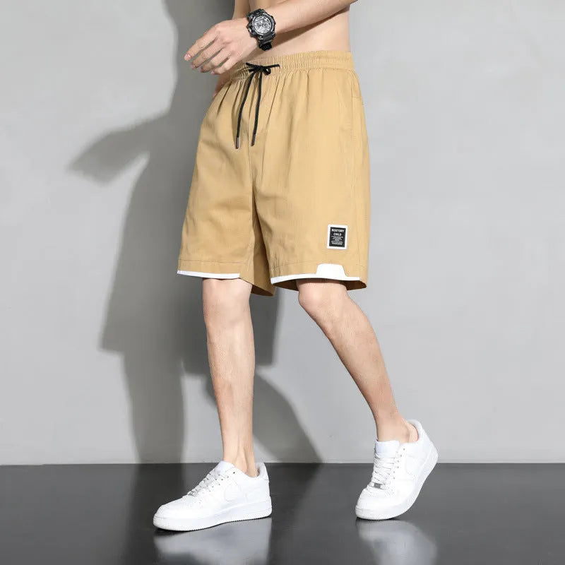 Boys cotton shorts in black, khaki, or white, shown in a loose-fitting Japanese style for summer.