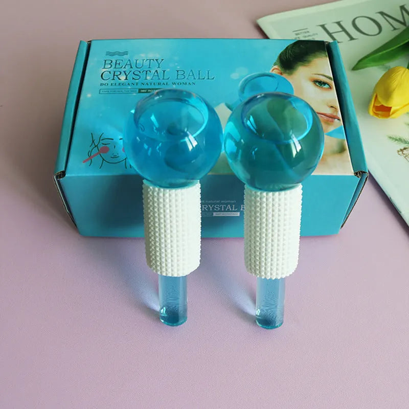 Set of two beauty ice wave ball face massage tools in purple flash finish on white background