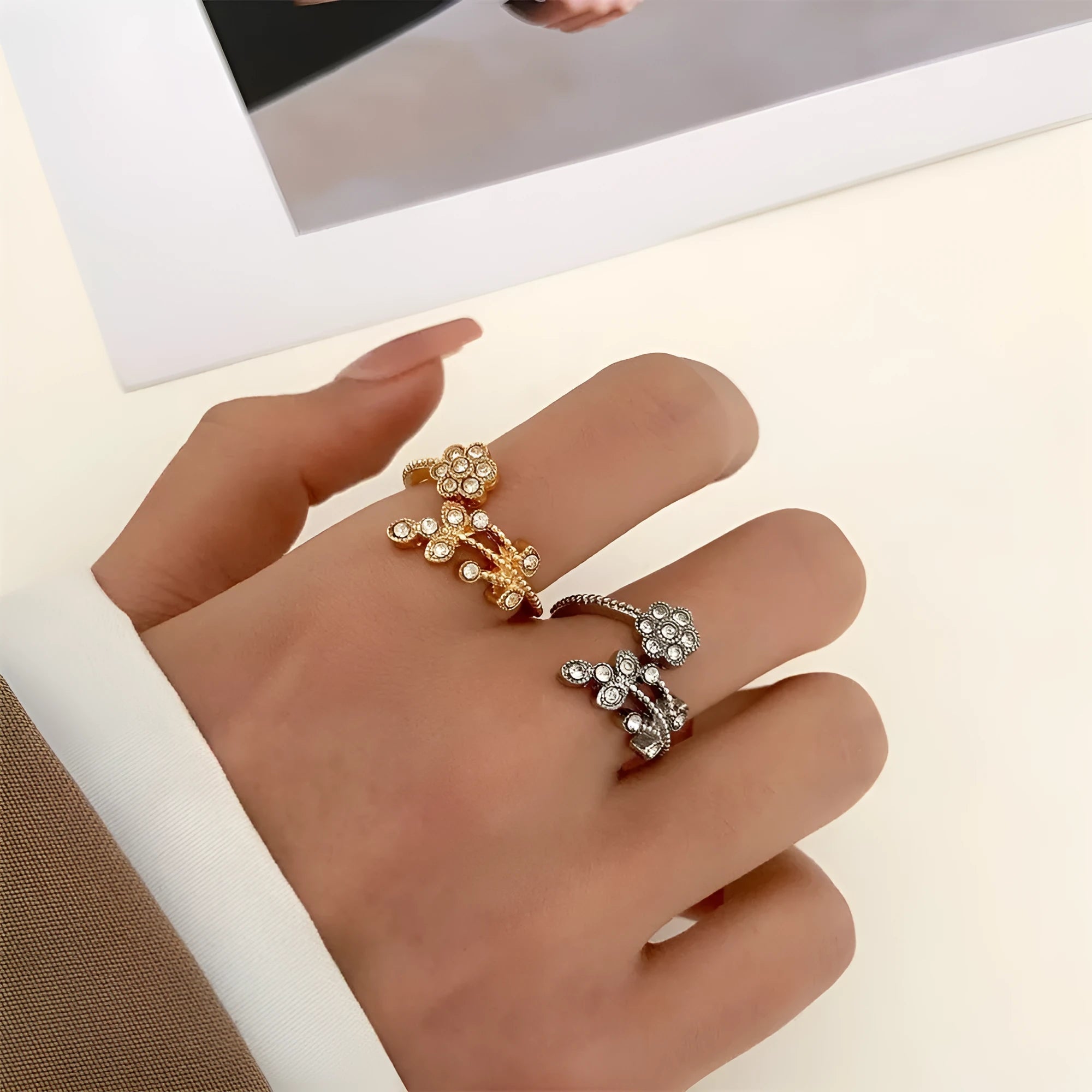Women's open ring with diamond flower and leaf design in gold or white colour on copper material