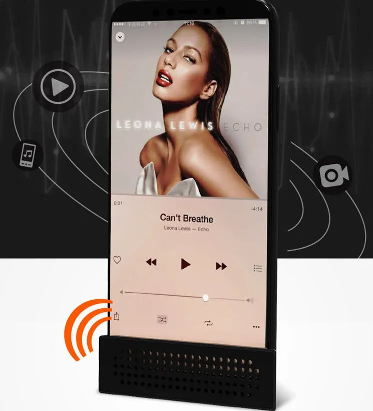 A portable black ABS plastic mobile phone amplifier bracket holding an iPhone.