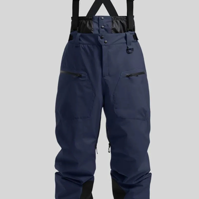 Men's black waterproof ski trousers with adjustable ankle straps on a model