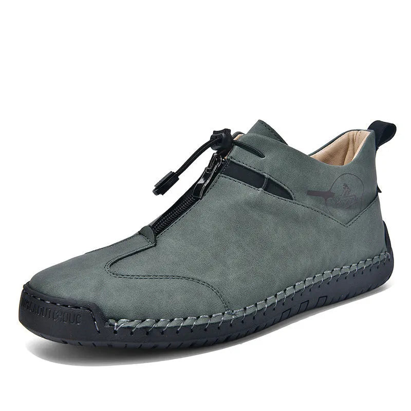 Men's black casual leather shoes with round toe and mid heel on a rubber sole