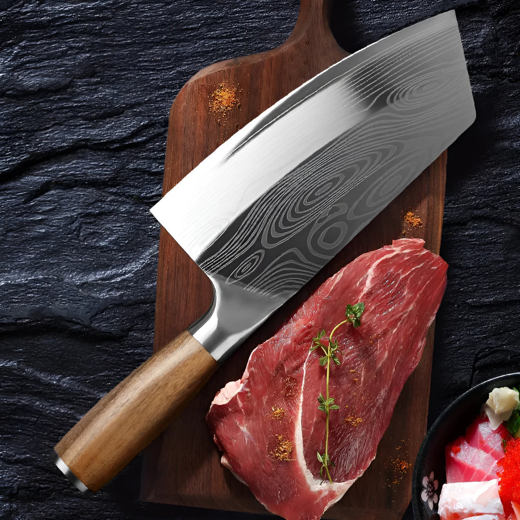 A stainless steel kitchen knife with a 320mm blade on a kitchen counter.