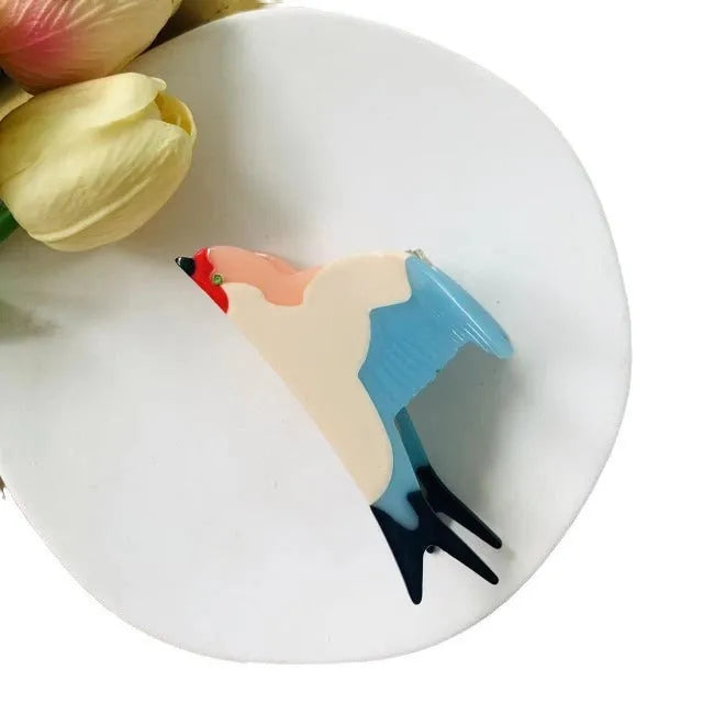 Handmade acetic acid grip with swallow design in blue and mottled texture