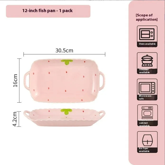 Cute strawberry pattern porcelain dinnerware set showing bowl, plate, and twist spoon on a table.