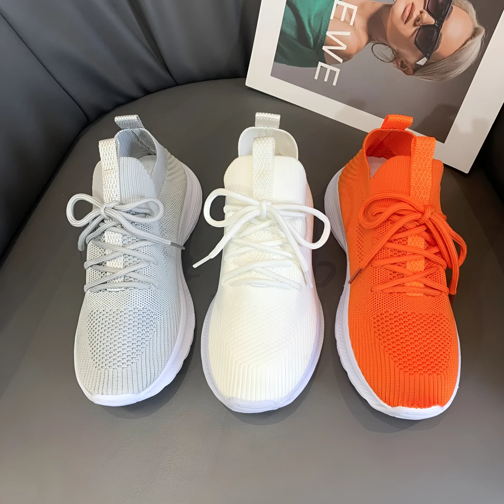 Women's Flyknit mesh running shoes in low-top tennis style with rubber sole
