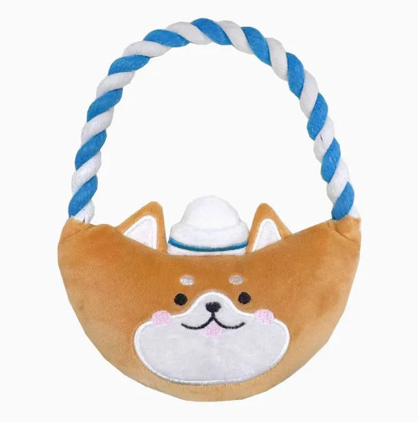 Plush dog toys in Xiaojiu butt, seal, whale, dolphin, and Shiba Inu shapes on a light background