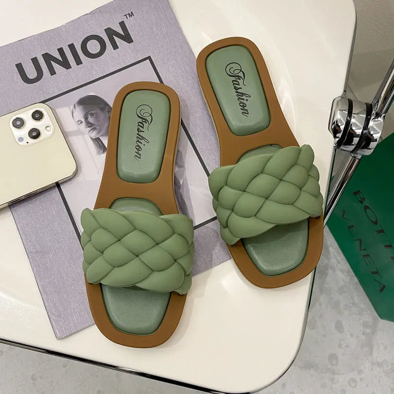 Women's plaid PVC beach sandals with thick anti-skid soles in black, green, orange and white.