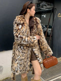 Women's long faux fur coat with fur collar in street fashion style
