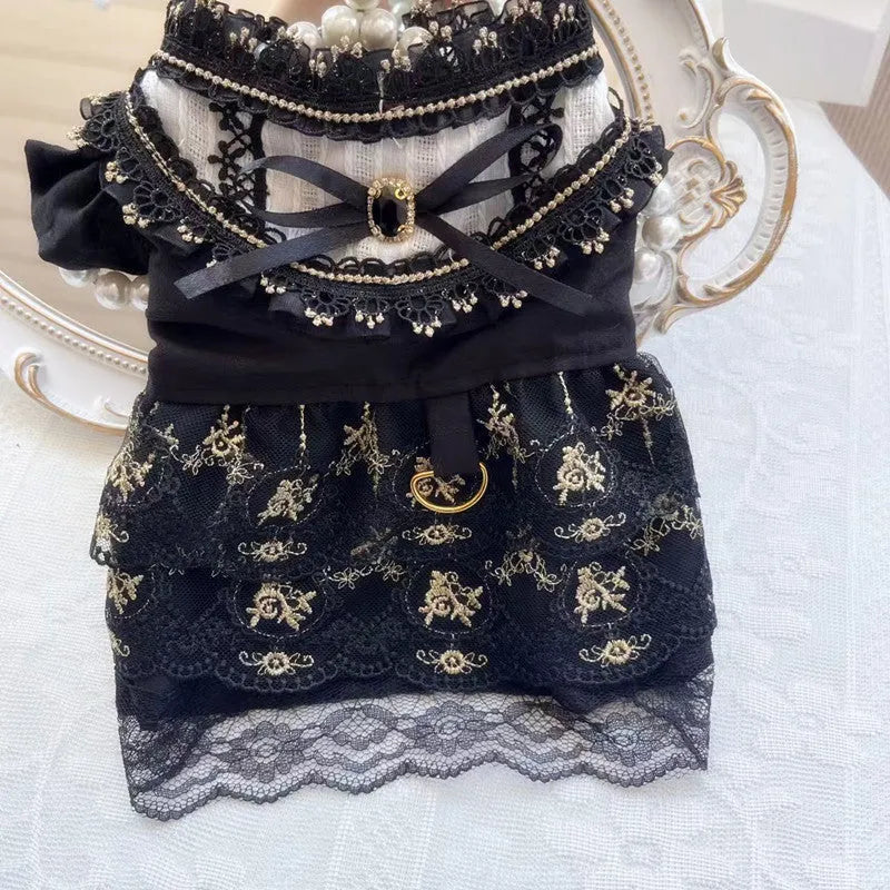Golden gothic princess-style skirt costume for a small dog on a white background.