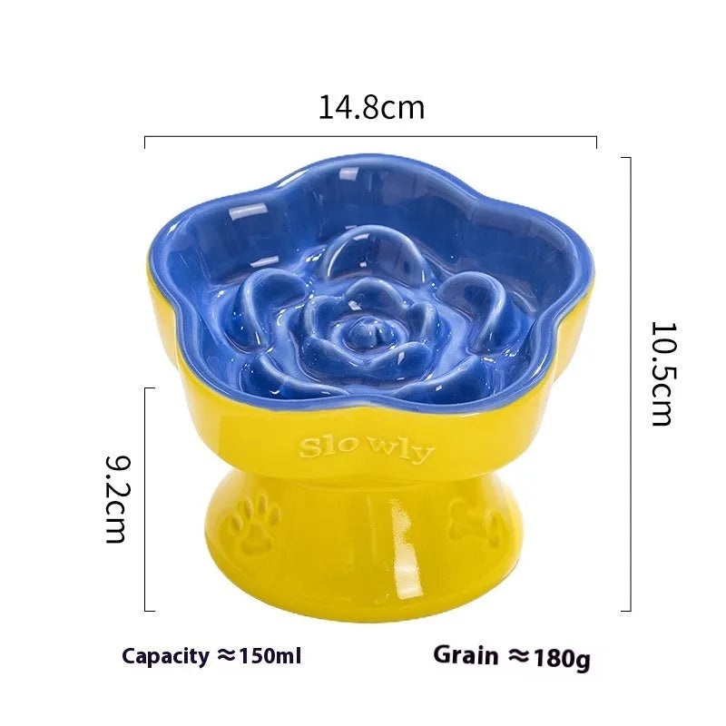Black chin-high foot ceramic pet bowl for dogs and cats on a flat surface.