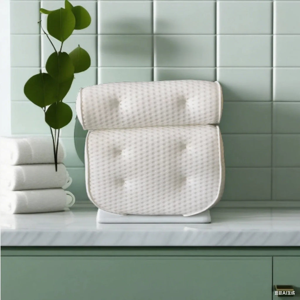 White bathtub pillow with 4D mesh fabric and seven large suction cups on a flat surface.