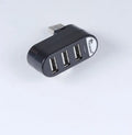 USB 2.0 four-port expansion hub in black and white colour options showing multiple USB ports