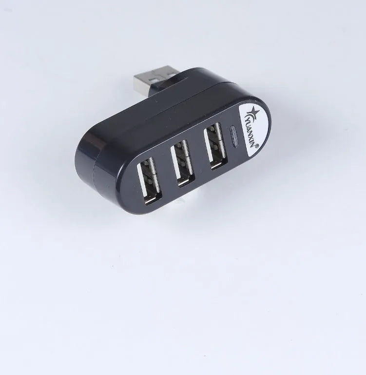USB 2.0 four-port expansion hub in black and white colour options showing multiple USB ports