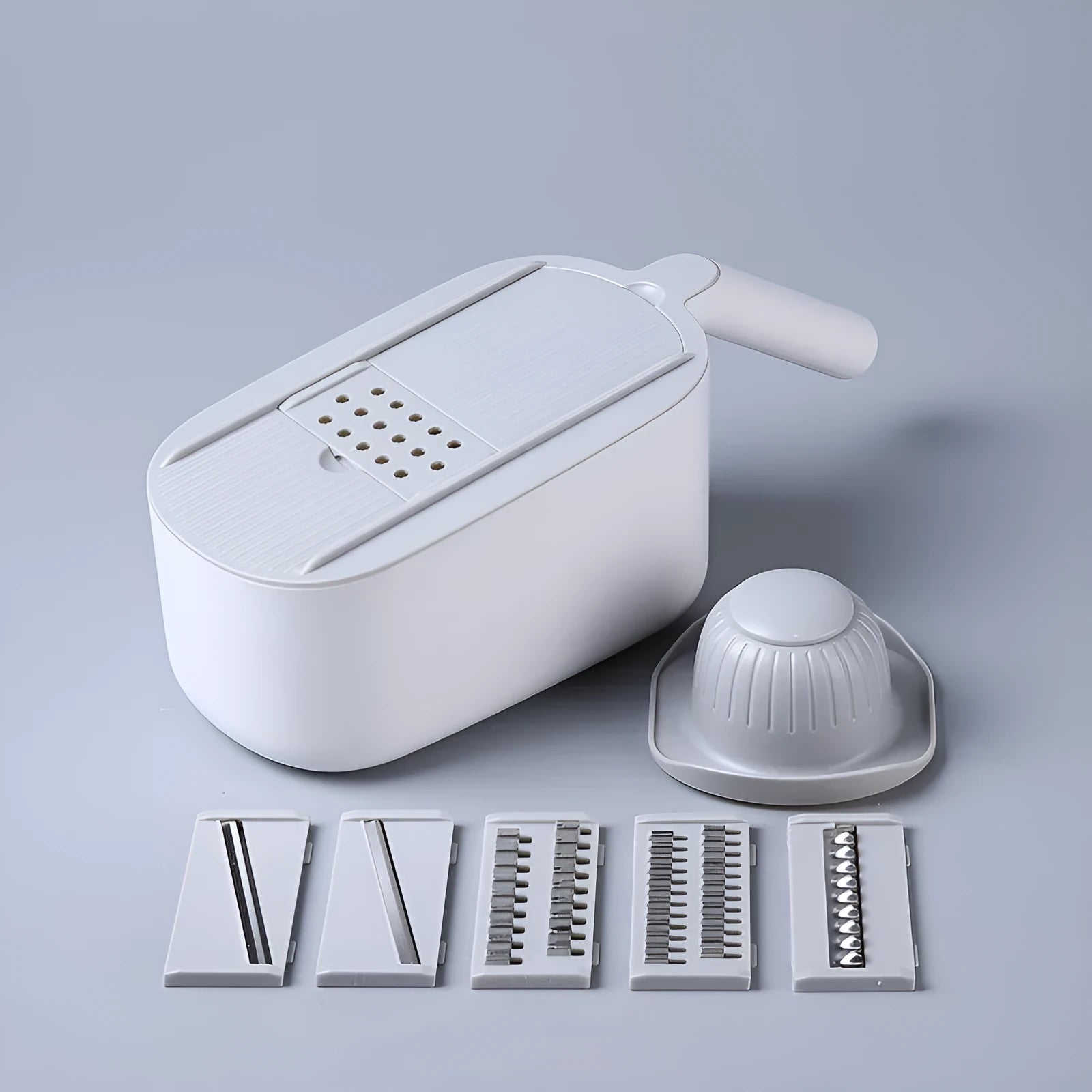 Multifunctional vegetable cutter in Nordic style with stainless steel blades, available in blue, grey, and khaki colours