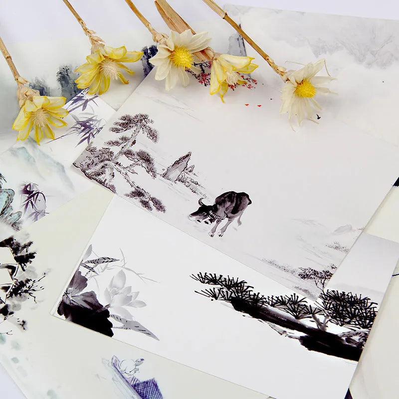 Set of nine Japanese style postcards showing various designs including ink painting and cat illustrations.