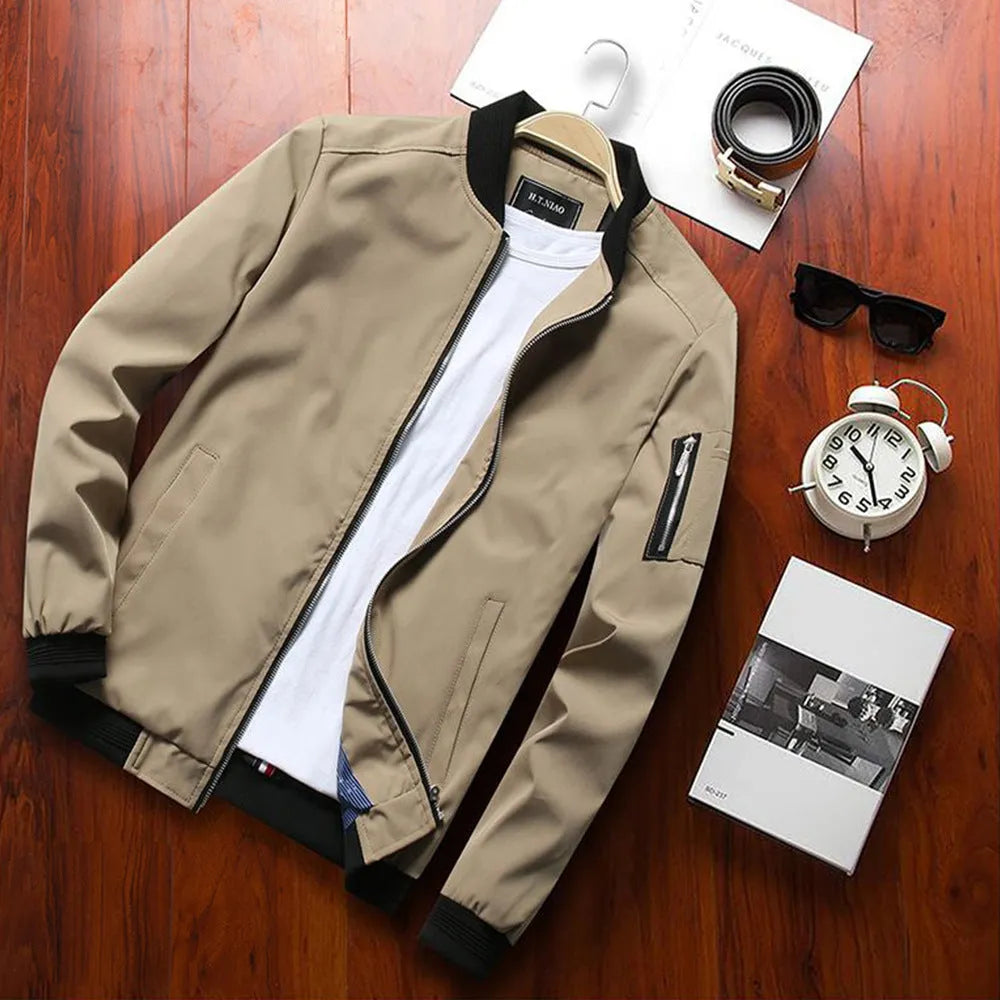 Men's slim-fit red casual zip-up jacket with stand collar and lateral seam pockets.