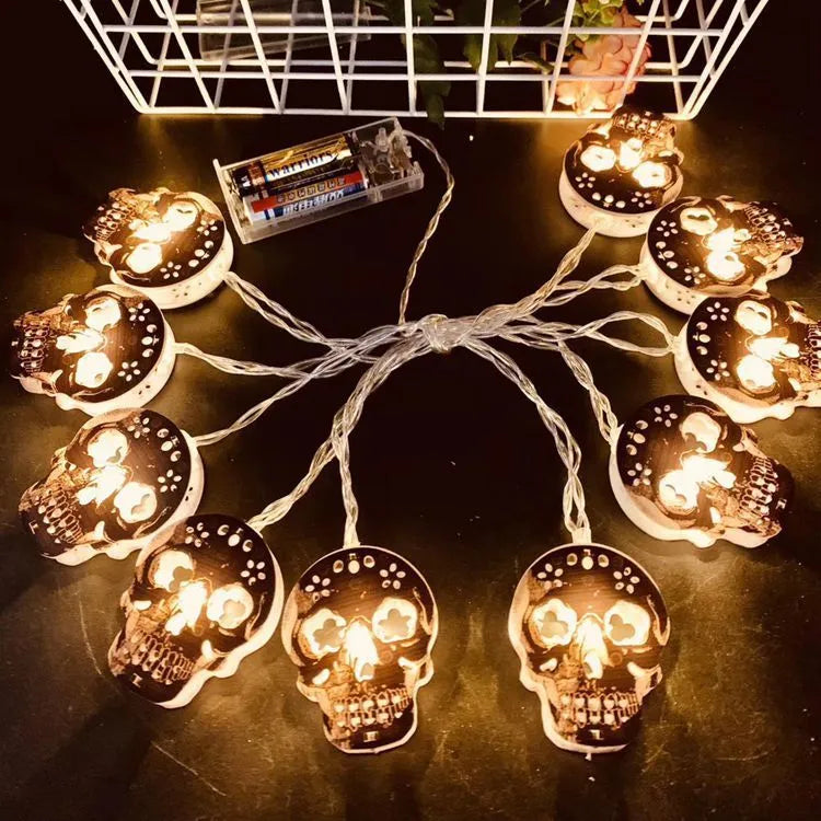 Skeleton-shaped Halloween decoration lights string, 1.5m with 10 warm white bulbs on a black cable