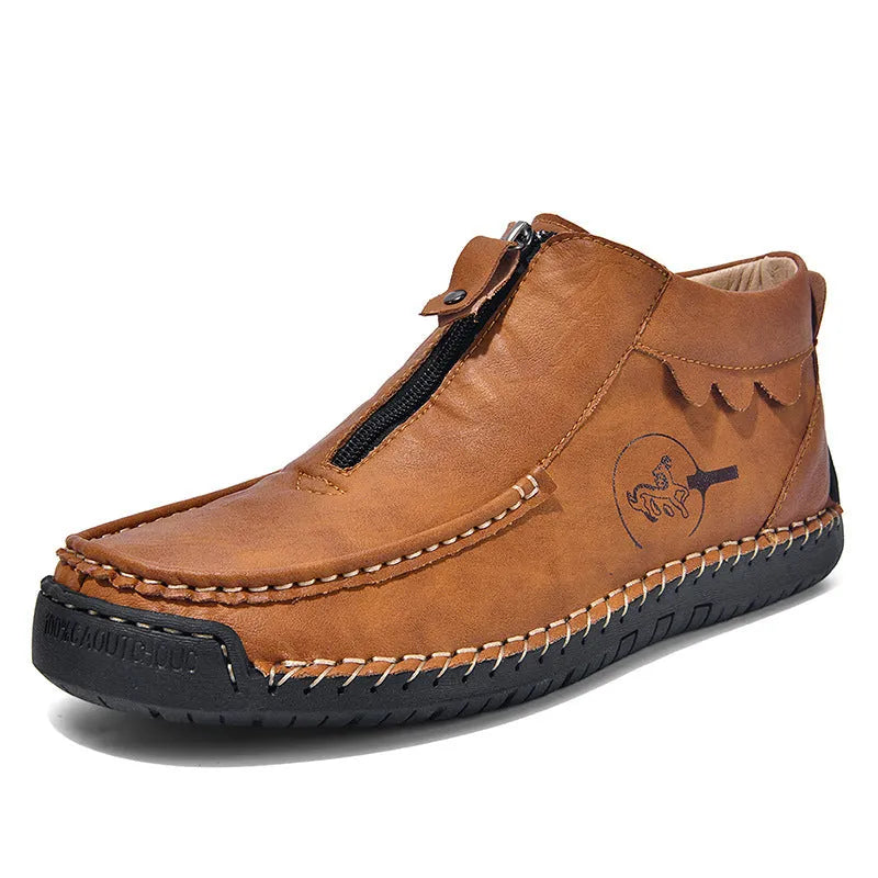 Men's black slip-on loafers with round toe and flat rubber sole on a white background.
