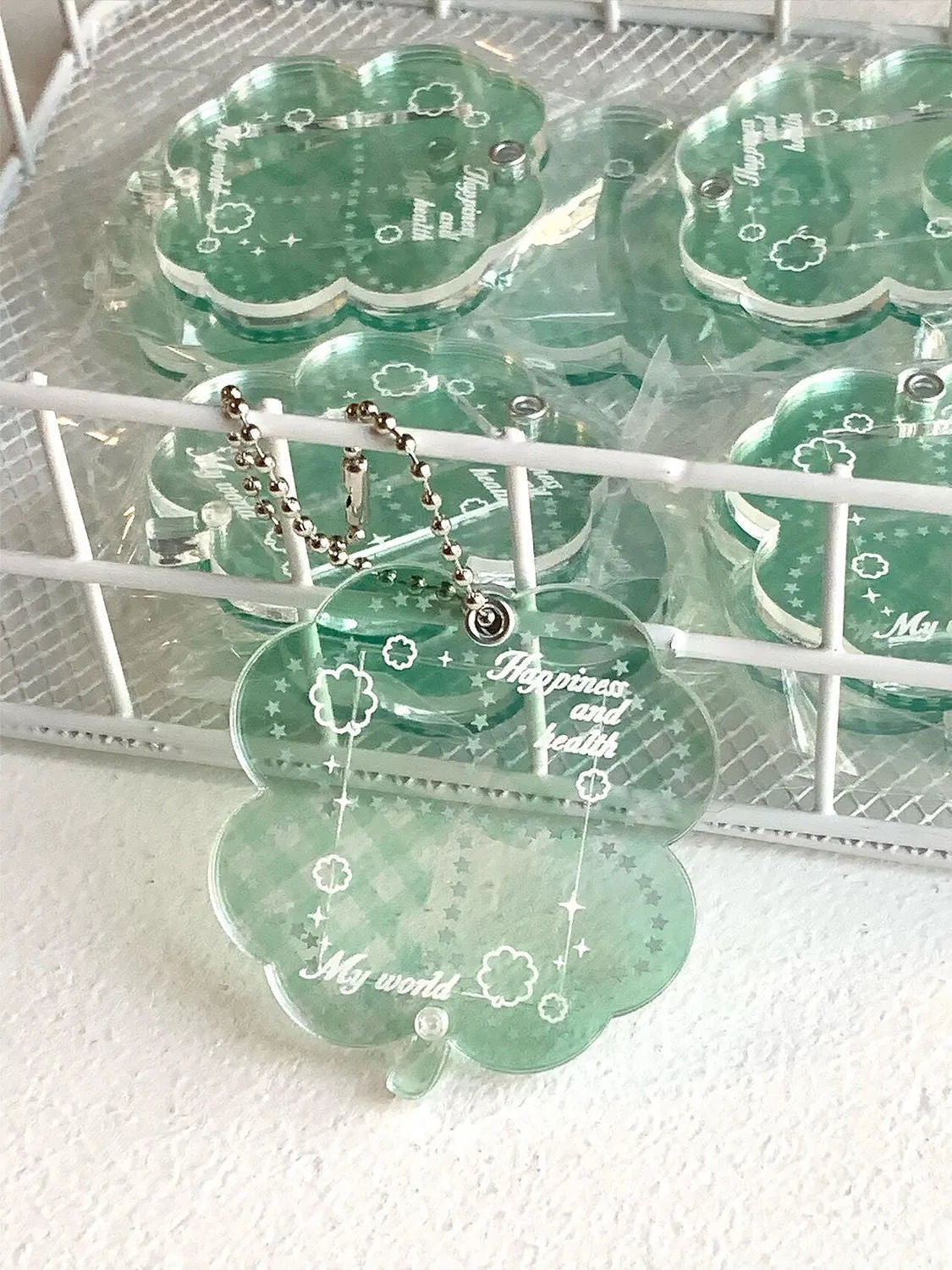 Acrylic four-leaf clover phone pendant keychain in blue and green colours