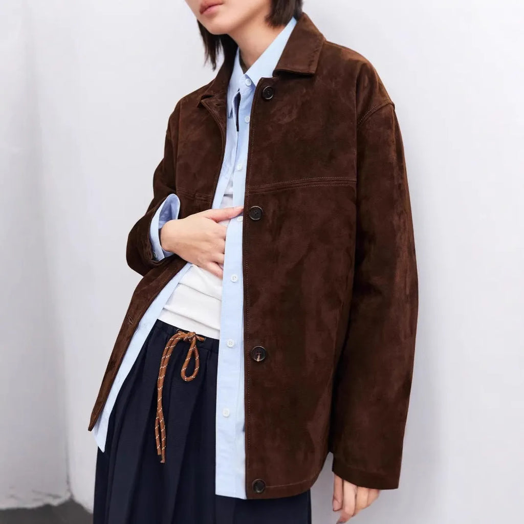 Yellow brown retro cashmere coat with a Peter Pan collar and leather stitching detail.