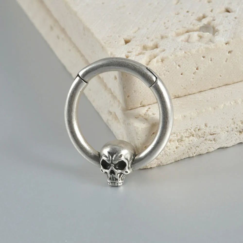 Copper vintage punk earrings with ghost head charms in antique silver or ancient gold finish.