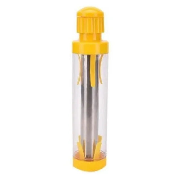 Yellow cylindrical corn stripper tool with stainless steel components on kitchen counter