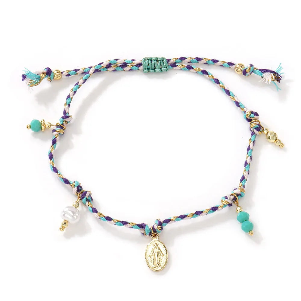 Close-up of a hand-woven colourful braided rope bracelet for women, showing textured ethnic style.
