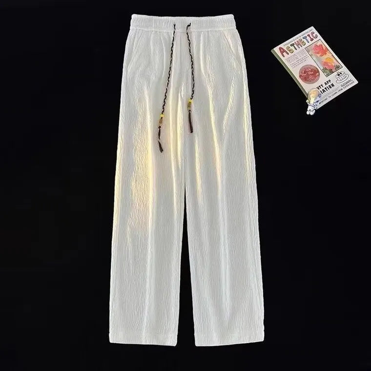 Men's thin loose straight trousers with Korean style folding craft in black and white options
