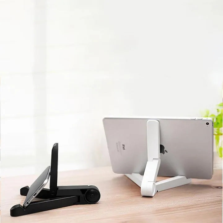 Black foldable tablet holder stand supporting a smartphone in landscape mode on a desk.