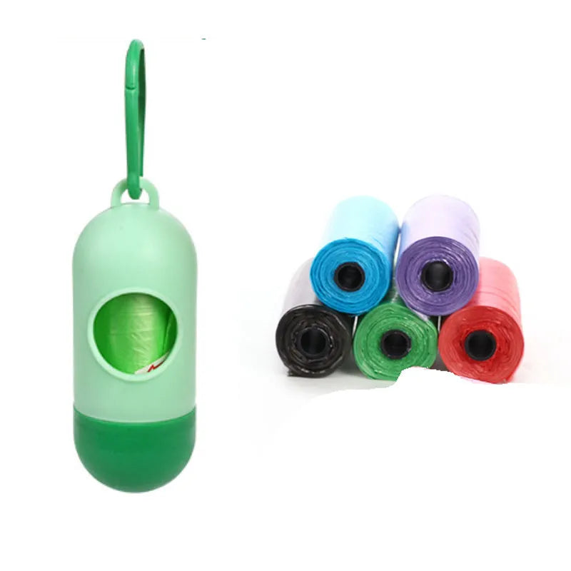 Roll of multi-coloured dog waste bags showing black, blue, green, and pink examples